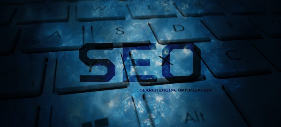 Close-up view of a keyboard with the text 'SEO' and 'Search Engine Optimization' displayed on the keys.