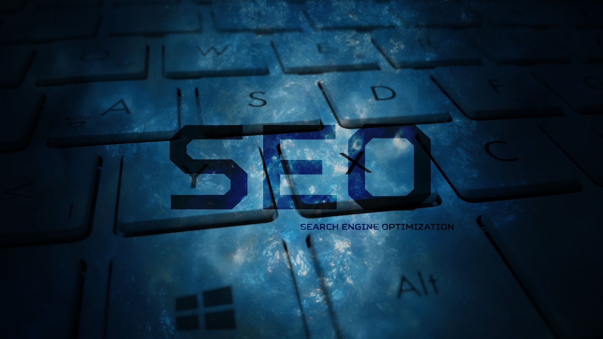 Close-up view of a keyboard with the text 'SEO' and 'Search Engine Optimization' displayed on the keys.